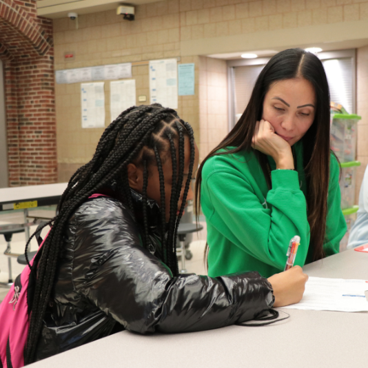  Monroe Social Worker Liz Casey works with a student